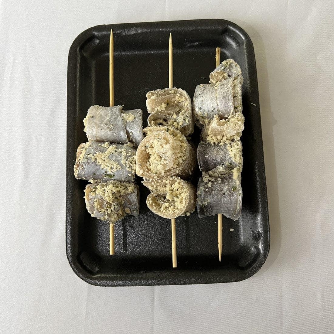Image 0 of Breaded Silver scabbard fish Rolls